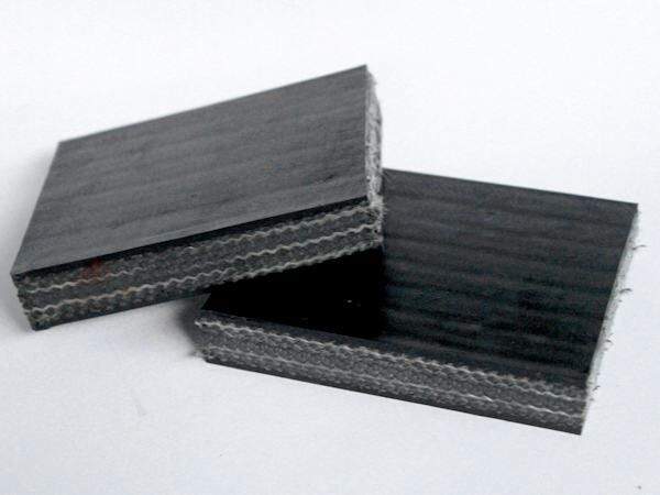 Whole core flame retardant conveyor belt