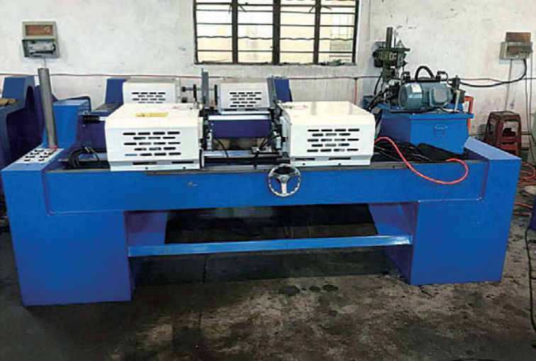 Shaft chamfering machine