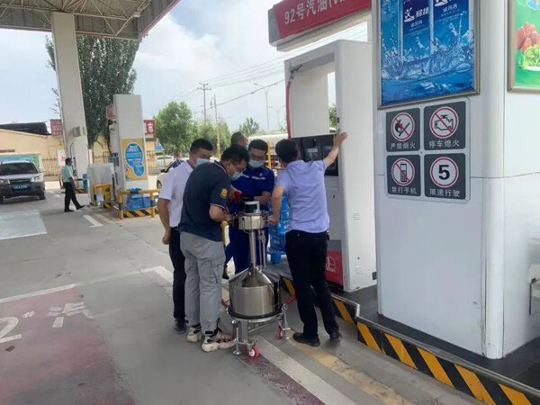 澳科于阿克苏开展OPC油枪自动检定装置演示交流