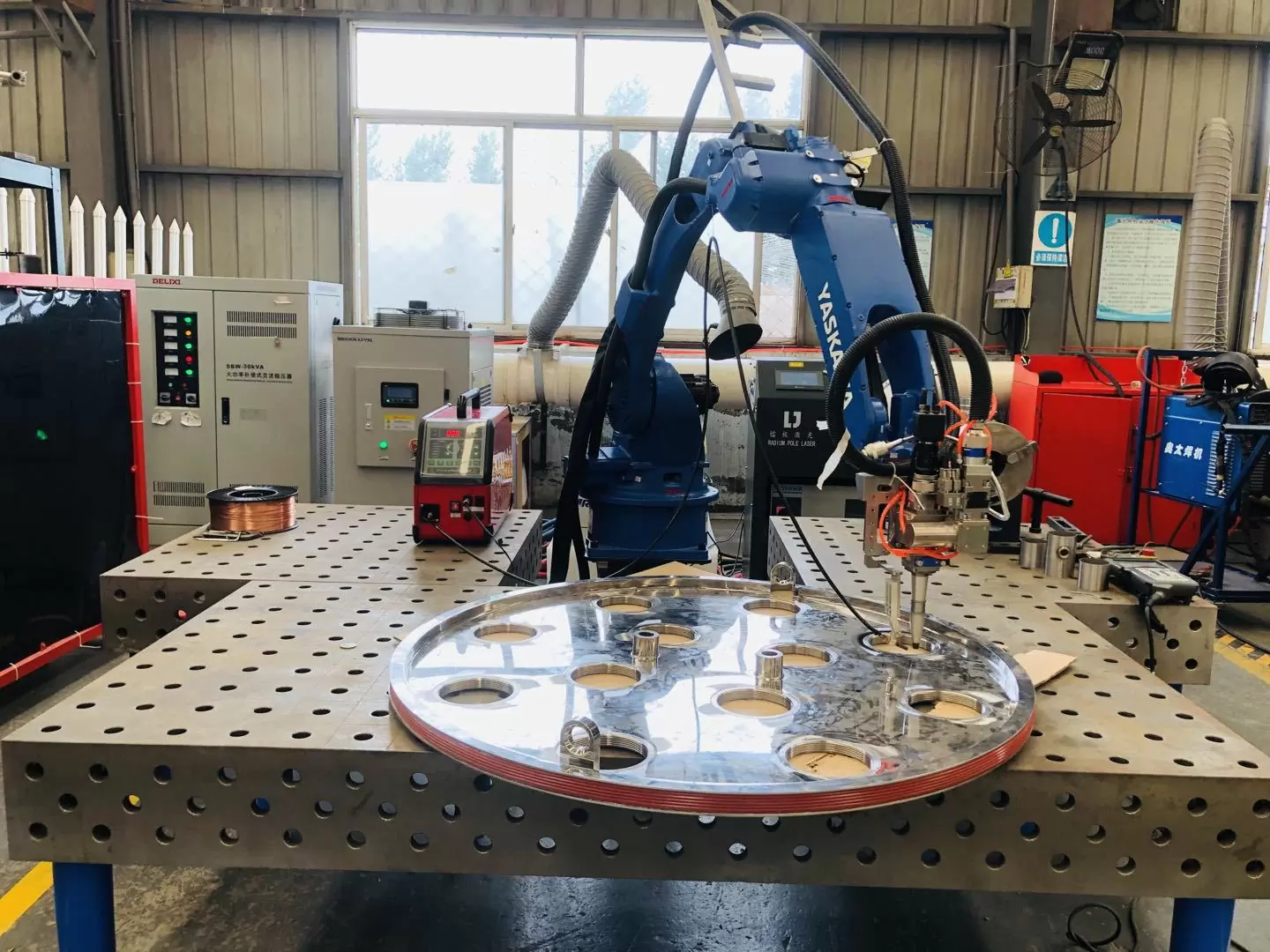 Welding arm