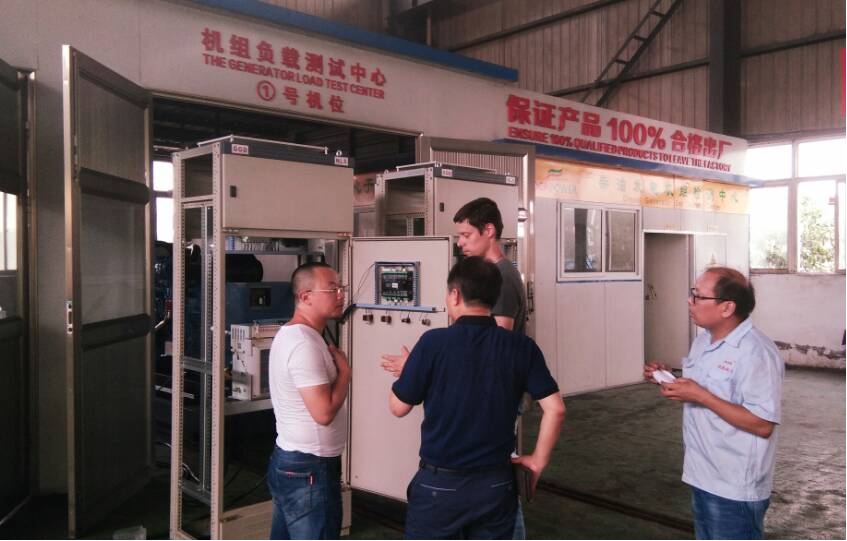 Nigerian customer's engineer visited our company to check the 400KW Cummins parallel unit on site. Nigerian customer's engineer visited our company to check the 400KW Cummins parallel unit on site.