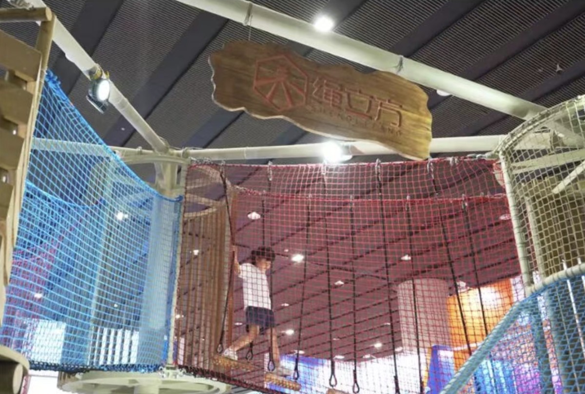 commercial-rope-net-playground-jungle-treehouse-play-area 绳立方亮相2025广州展:丛林木屋绳网乐园,解锁亲子游乐新体验